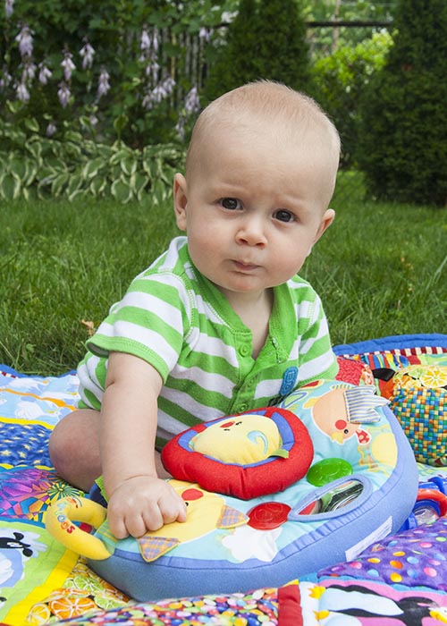 Elliot Sitting in his Backyard
